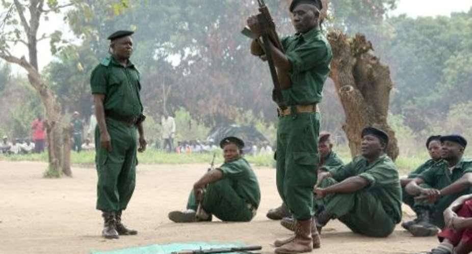 A photo taken on November 8, 2012 shows fighters of the former Mozambican rebel movement Renamo receiving military training in Gorongosa's mountains.  By Jinty Jackson AFPFile