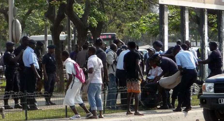 File picture shows police arresting protesters in Luanda, the capital of Angola, where the International Federation for Human Rights says rights activists and journalists are increasingly being targeted by the regime.  By Estelle Maussion AFPFile