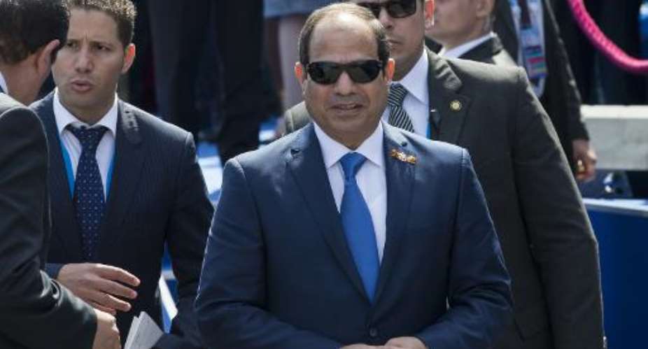 Egyptian President Abdel Fattah al-Sisi C begins Tuesday a visit to Germany at Merkel's invitation.  By Alexander Zemlianichenko PoolAFPFile