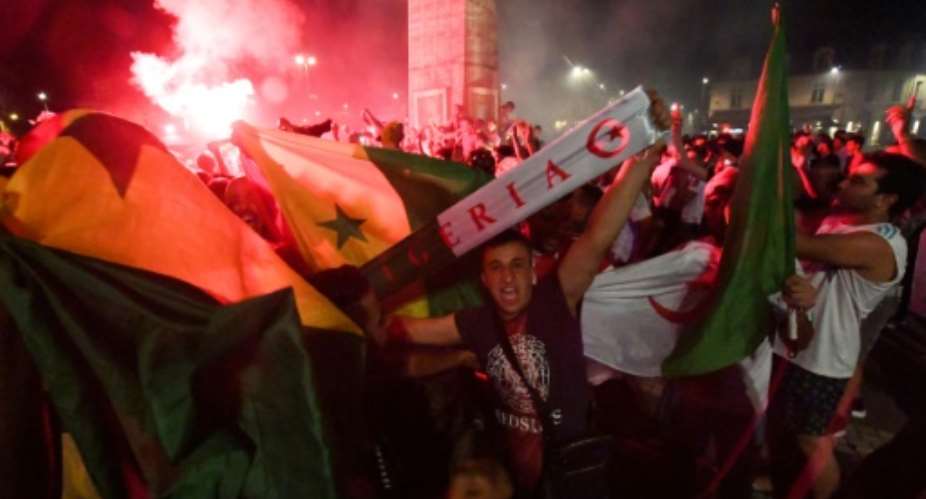 Riotous celebrations erupted around France after the Algerian football team qualified for the final of the Africa Cup of Nations.  By MEHDI FEDOUACH AFP