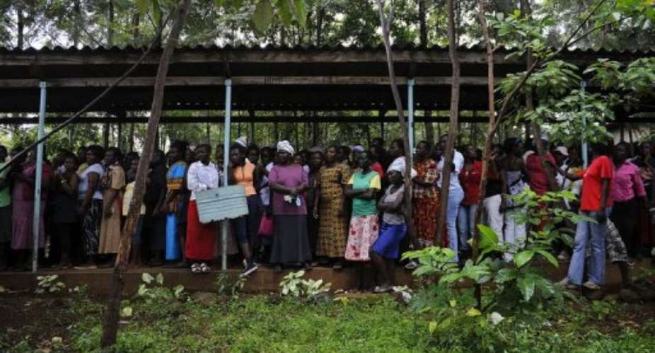 Kenyans queue up to vote in political party primary nominations on January 17, 2013, in Kisumu.  By Tony Karumba AFPFile