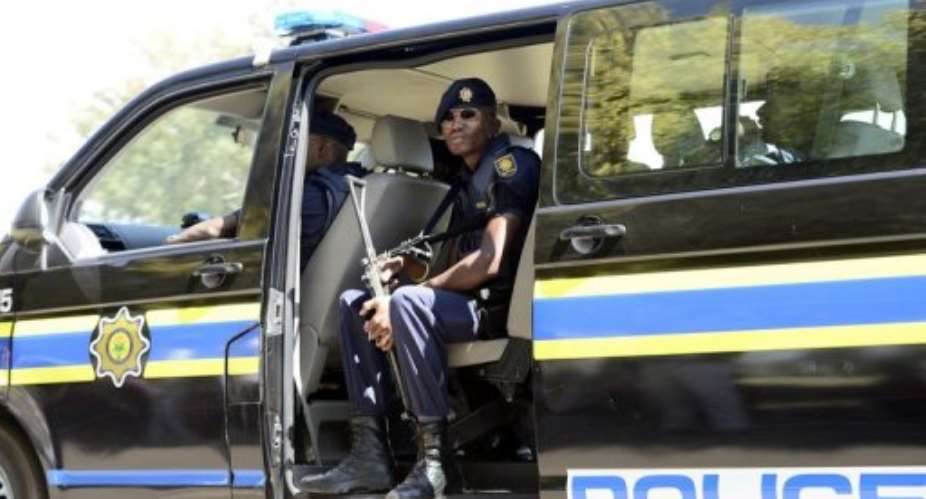 South African police patrol in Elspark on April 10, 2013.  By Stephane de Sakutin (AFP/File)