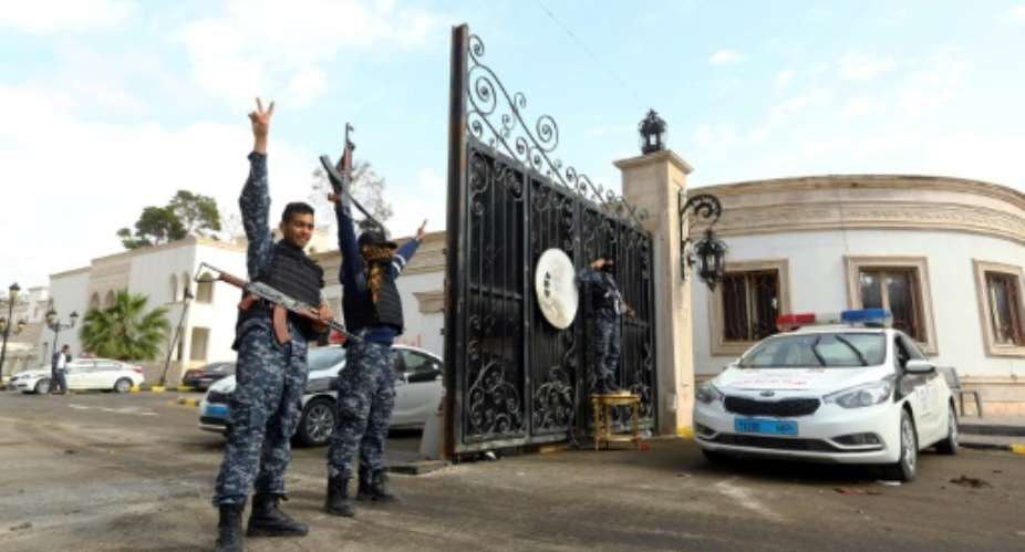 Rival Libyan militias first clashed for control of a luxury villa complex in Tripoli, that used to serve as the headquarters of ex-premier Khalifa Ghweil.  By MAHMUD TURKIA AFP