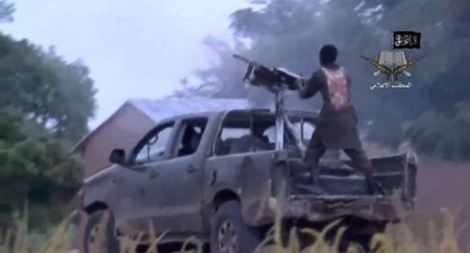 A screengrab taken on August 24, 2014 from a video released by Boko Haram shows alleged members of the Islamist extremist group fighting in Nigeria.  By  Boko HaramAFPFile
