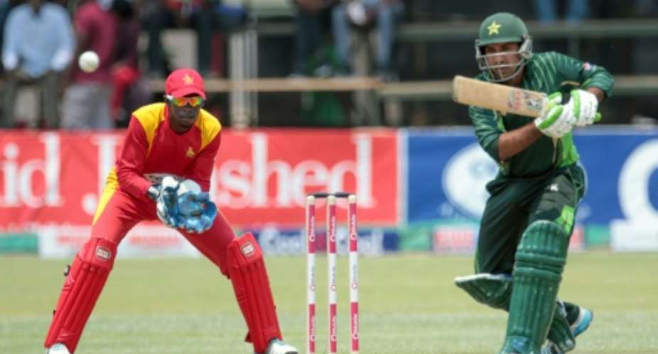 Pakistan batsman Shoaib Malik plays a shot during the first in a series of three ODI cricket matches between Pakistan and Zimbabwe at the Harare Sports Club in Harare on October 1, 2015.  By Jekesai Nijikizana AFP