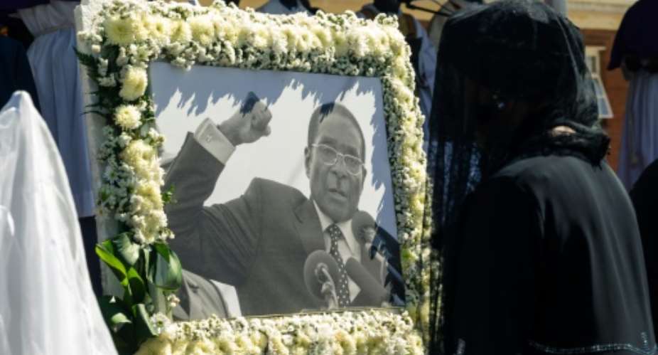 Robert Mugabe died aged 95 in a Singapore hospital.  By Jekesai NJIKIZANA AFPFile