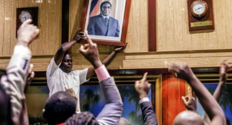 Robert Mugabe's 37-year tenure was marked by accusations of rights abuses, electoral fraud and economic ineptitude.  By Jekesai NJIKIZANA AFP