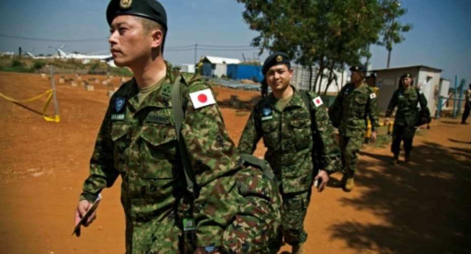 Roughly 350 Japanese military engineer troops are in South Sudan as part of the UN peacekeeping mission to perform tasks such as road construction and maintenance.  By  AFPFile