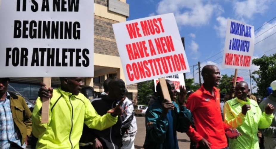 Kenyan athletes protest in Nairobi to demand that officials accused of corruption be sacked and for doping allegations to be properly investigated on November 23, 2015.  By Simon Maina AFP