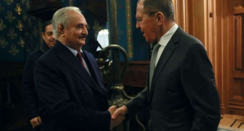 Russian Foreign Minister Sergei Lavrov welcomes Libya's military strongman Khalifa Haftar in Moscow.  By HO RUSSIAN FOREIGN MINISTRYAFP