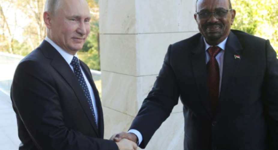 Russian President Vladimir Putin met his Sudanese counterpart Omar al-Bashir during a meeting in Sochi on November 23.  By Mikhail KLIMENTYEV SPUTNIKAFPFile