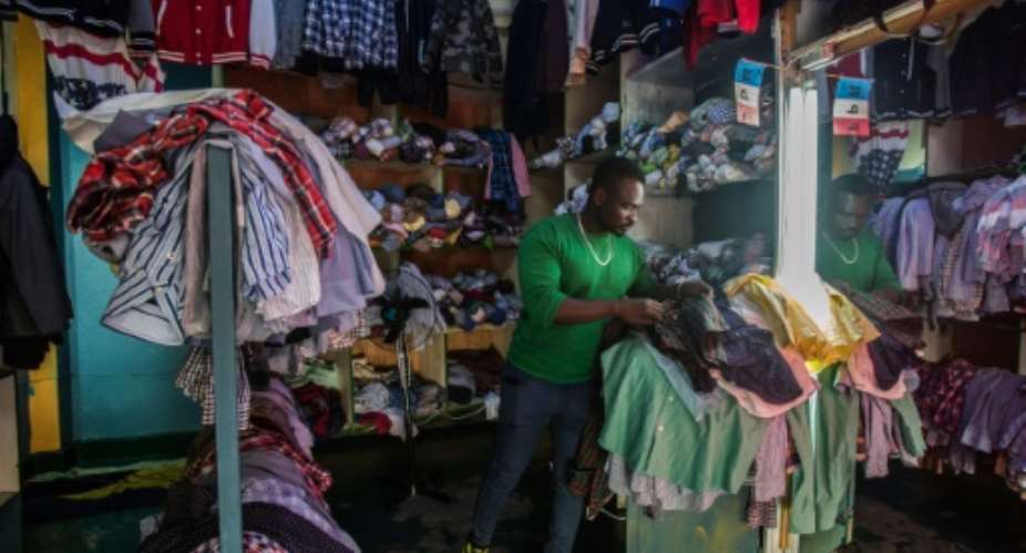 Rwanda blames used clothing -- which mainly comes from the US -- for undermining the development of its local textile industry.  By Jacques NKINZINGABO AFPFile