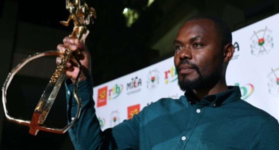 Rwandan director Joel Karekezi, winner of the Golden Stallion of Yennenga in 2019 for 'The Mercy of the Jungle.' The trophy is named after a beast in Burkinabe mythology.  By ISSOUF SANOGO AFP