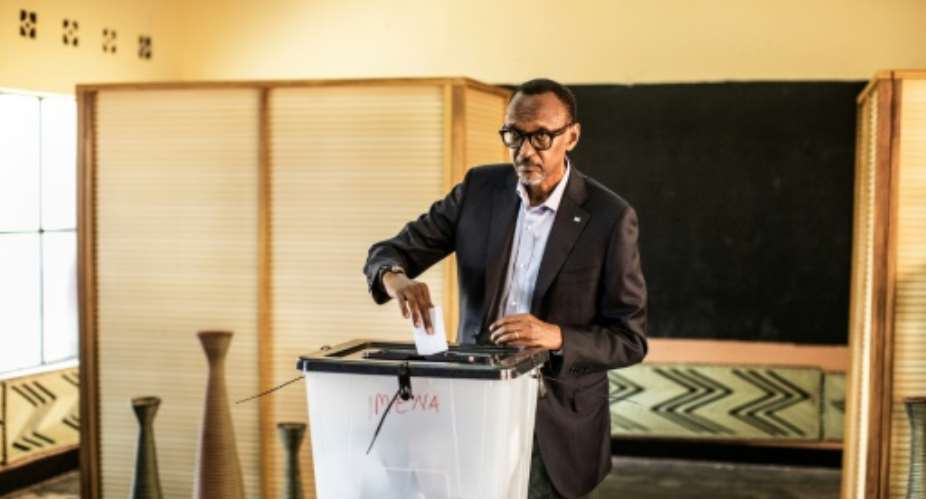 Rwandan President Paul Kagame casts his vote in Kigali in an election widely expected to return him to office for a third time.  By MARCO LONGARI AFP