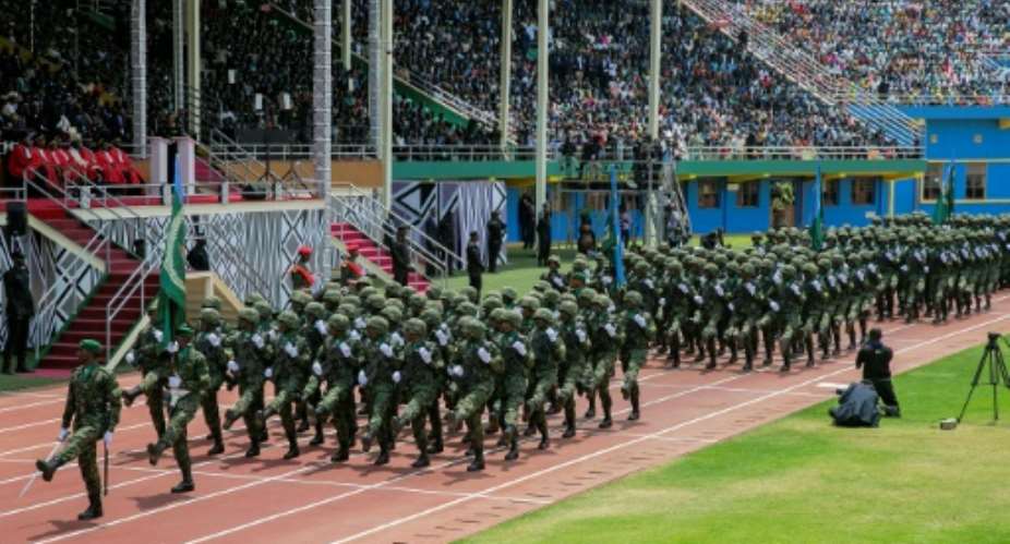 Rwandan soldiers march during the swearing-in ceremony for President Paul Kagame's third term in August.  By CYRIL NDEGEYA AFPFile