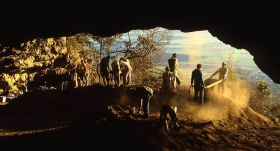 Workers at South Africas Border Cave.  By Paola Villa (AFP/University of Colorado/File)