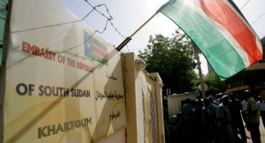 People line up outside the embassy of the newly-independent South Sudan.  By Ashraf Shazly (AFP/File)