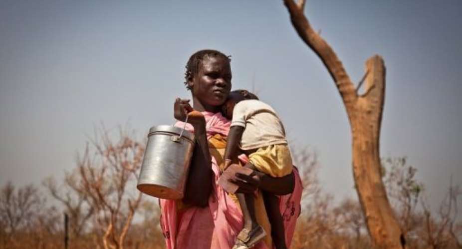 A displaced woman and her child from the Nuba Mountains in Sudan in Yida, South Sudan.  By Adriane Ohanesian (AFP/File)
