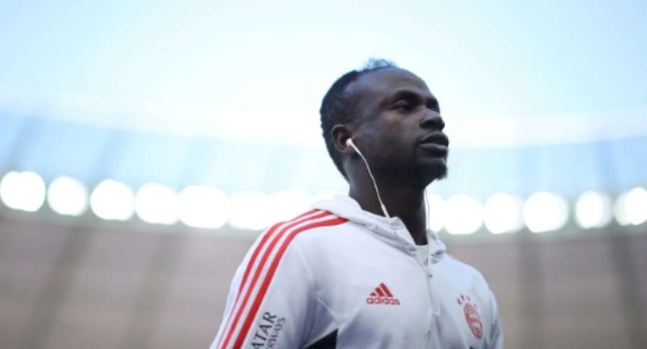 Sadio Mane is a two-time African player of the year who finished runner-up to Karim Benzema for this year's Ballon d'Or.  By Ronny Hartmann AFP