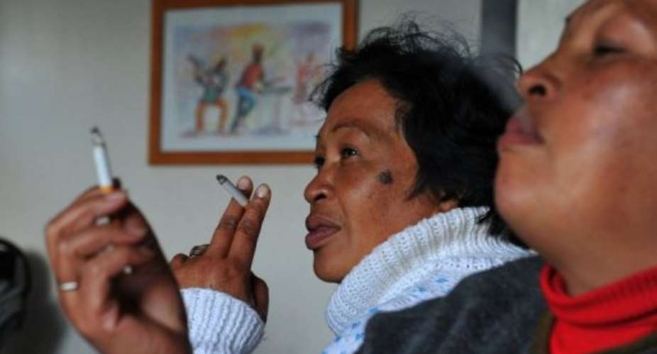 South African authorities are working at tightening the countrys anti-smoking laws.  By Alexander Joe (AFP/File)