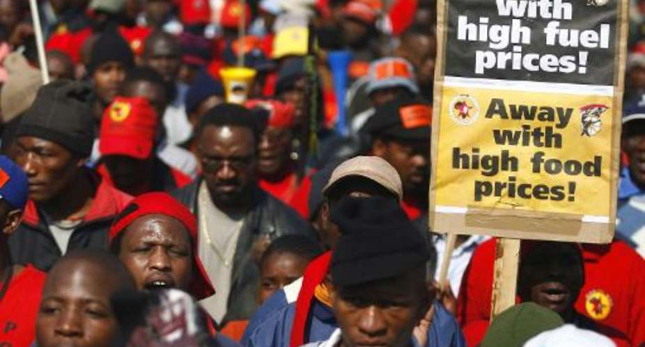 South African protestors march to the Eskom offices in Johannesburg on July 23, 2008.  By Paballo Thekiso AFPFile