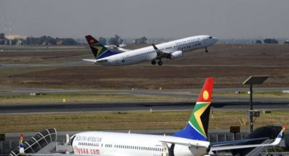 A South African airways flight takes off at Johannesburg airport.  By Gianluigi Guercia (AFP/File)