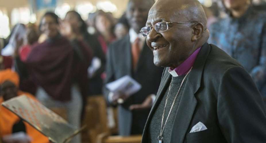 Archbishop Desmond Tutu, pictured at the Holy Cross Anglican Church on July 4, 2015, was hospitalised with a persistent infection just a week after being discharged following treatment for the same ailment.  By Muhahid Safodien AFPFile