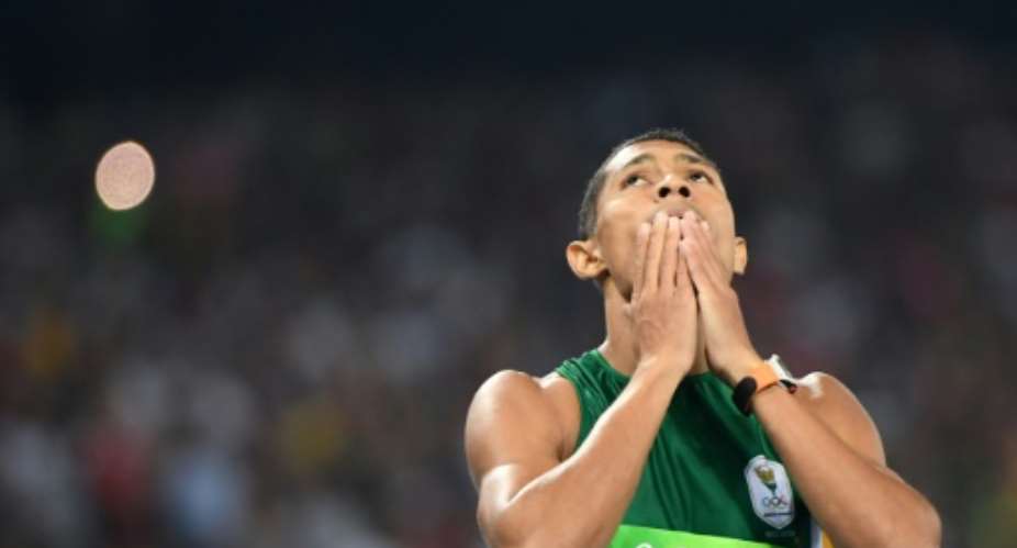 South Africa's Wayde van Niekerk blasted off the final corner to time 43.03sec, 0.15sec quicker than Michael Johnson's previous world best set in 1999.  By Olivier Morin AFP