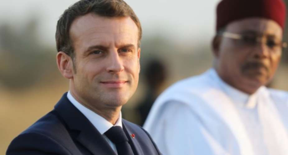 Sahel commitment: Macron alongside President Mahamadou Issoufou in Niamey last December.  By Ludovic MARIN POOLAFP