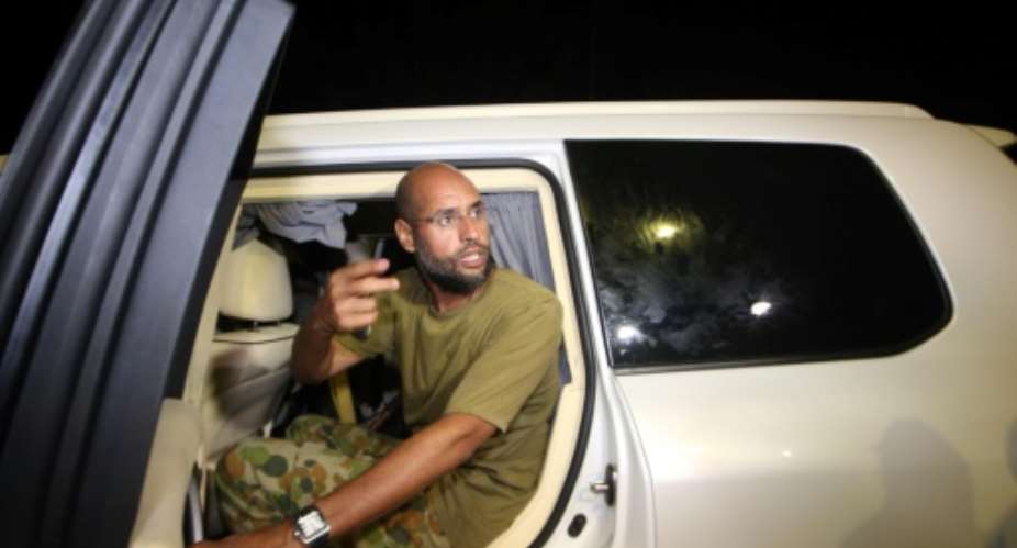 Saif al-Islam Kadhafi, shown in this file photo taken on August 23, 2011 in the Libyan capital Tripoli, is said to have been freed after more than five years in captivity.  By IMED LAMLOUM AFPFile
