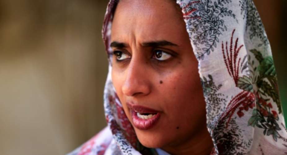 Sarah al-Fateh, general manager at Teital Oil Mills in Sudan's capital, says she is unable to import replacement parts due to sanctions.  By Ashraf SHAZLY AFP