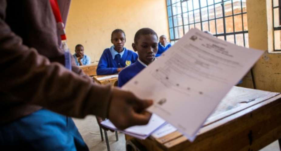 School's out: Primary and secondary pupils in Kenya have been told to return to class in January because of coronavirus.  By PATRICK MEINHARDT AFP