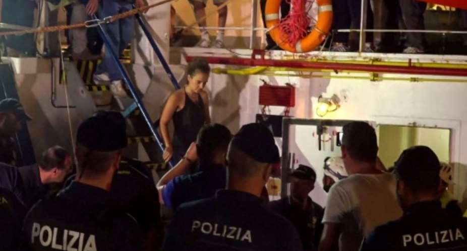 Sea-Watch captain Carola Rackete was detained for refusing to obey a military vessel, a crime by up to 10 years in jail.  By Anaelle LE BOUEDEC LOCALTEAMAFP