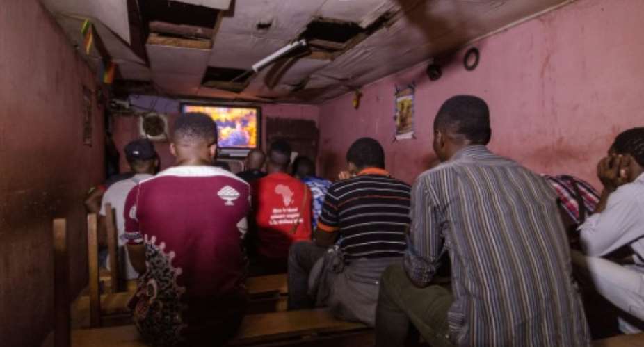 Secret home: The video club in Yaounde is a haven for gay men in a country where same-sex relations are illegal.  By STR AFP