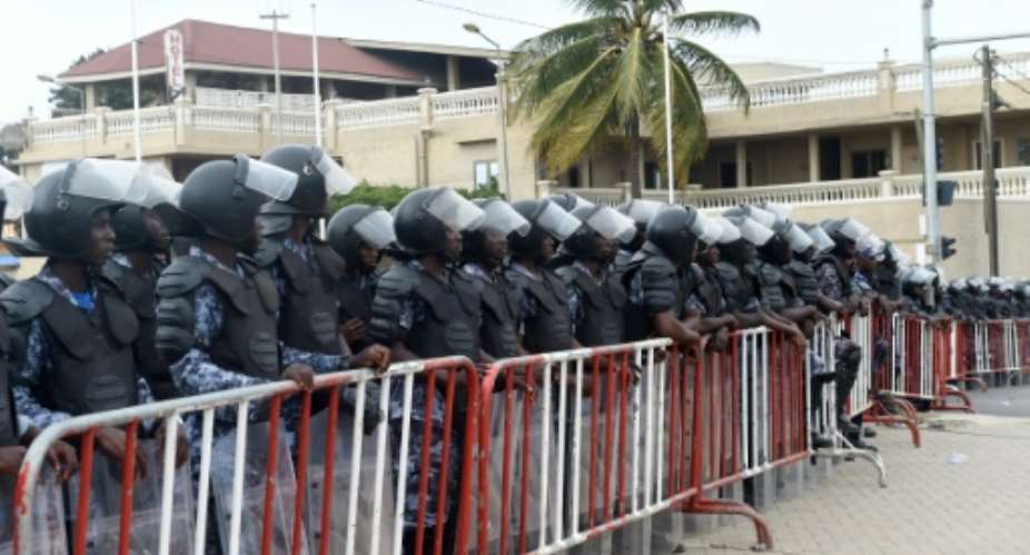 Security forces have closed off all opposition meeting points in the Togolese capital as well as firing tear gas near the opposition headquarters.  By PIUS UTOMI EKPEI AFPFile