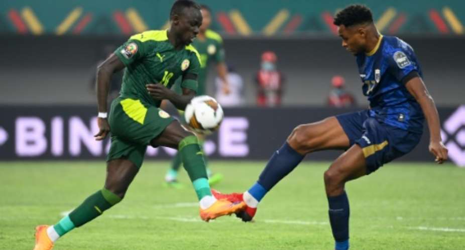 Senegal forward Sadio Mane L tries to evade Cape Verde defender Steven Fortes during an Africa Cup of Nations last-16 match in Bafoussam..  By Pius Utomi EKPEI AFP