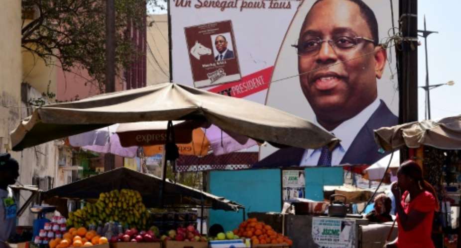 Senegal has known two peaceful power transfers, in 2000 and 2012, and no coup d'etat.  By SEYLLOU AFP