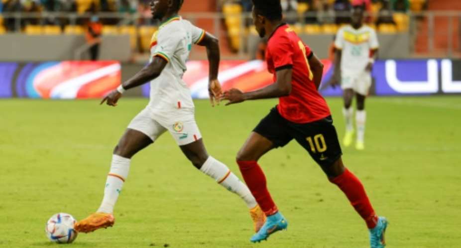 Senegal star Sadio Mane L attcks against Mozambique in Dakar..  By John Wessels AFP