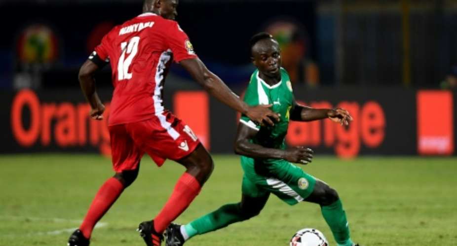 Senegal star Sadio Mane R contests possession with Kenyan Victor Wanyama at the Africa Cup of Nations.  By Khaled DESOUKI AFP