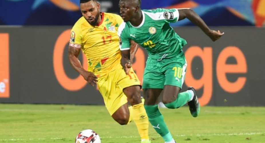 Senegal star Sadio Mane R makes a run during the  Africa Cup of Nations quarter-final win over Benin in Cairo.  By MOHAMED EL-SHAHED AFP