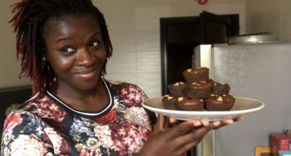 Senegal-based blogger Karelle Vignon-Vullierme has built up an adoring online audience of thousands by whipping up mouth-watering meals from all corners of the globe. Hers is a story of love, the internet and plenty of chocolate cake..  By SEYLLOU AFP