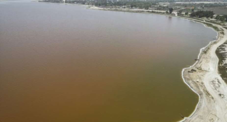 Senegals Lake Retba, widely known as the Pink Lake, is a tourist magnet.  By PATRICK MEINHARDT (AFP)
