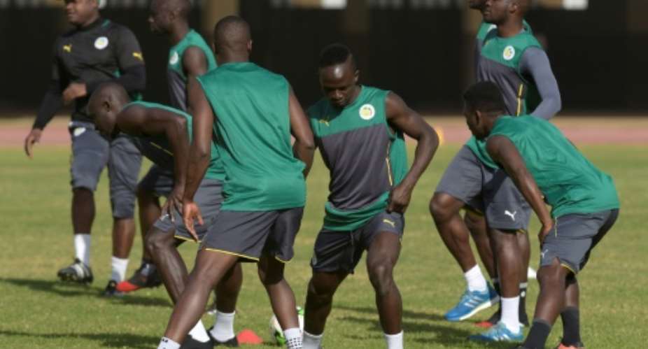 Senegal's national football team players take part in a training session on January 4, 2017, at the Leopold Sedar Senghor stadium in Dakar, during preparations for the upcoming 2017 Africa Cup of Nations in Gabon.  By SEYLLOU AFPFile