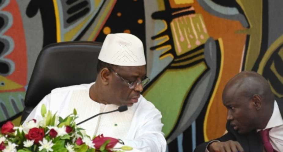 Senegal's President Macky Sall L and his Interior minister Aly Ngouille Ndiaye launched a national dialogue project though most opposition parties boycotted.  By Seyllou AFP