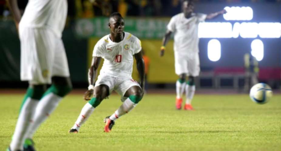 Senegal's Sadio Mane C vies for the ball during the World Cup 2018 qualifier match Senegal versus Cape Verde on October 8, 2016 at the Leopold Sedar Senghor stadium in Dakar.  By SEYLLOU AFPFile