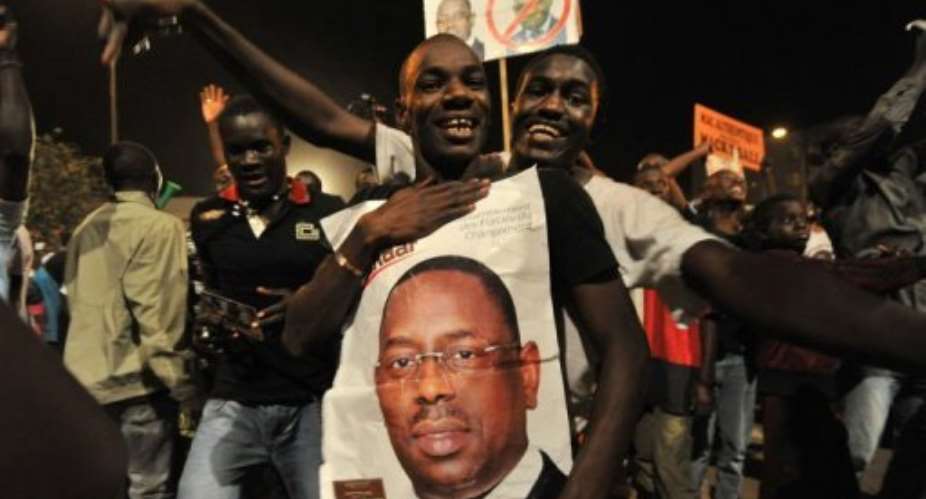 Senegal was jubilant after an election that brought Wade's increasingly controversial rule to a crushing end.  By Issouf Sanogo AFP