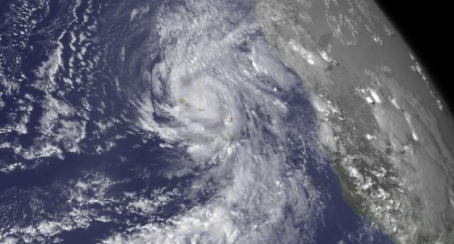 This NOAA satellite image obtained September 1, 2015, taken by GOES East at 1745Z on August 31, shows Hurricane Fred bringing heavy rains to the Cape Verde Islands.  By  NOAAAFPFile