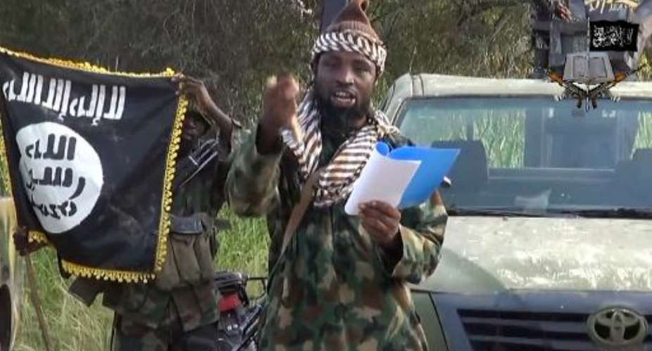 A screengrab taken on October 2, 2014 from a Boko Haram video shows Boko Haram leader Abubakar Shekau delivering a speech.  By - BOKO HARAMAFP