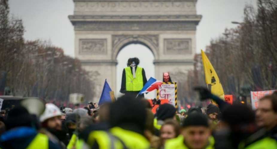 Several hundred 'yellow vest' protestors took the Champs Elysees Saturday, their first demonstration of the year.  By Lucas BARIOULET AFP