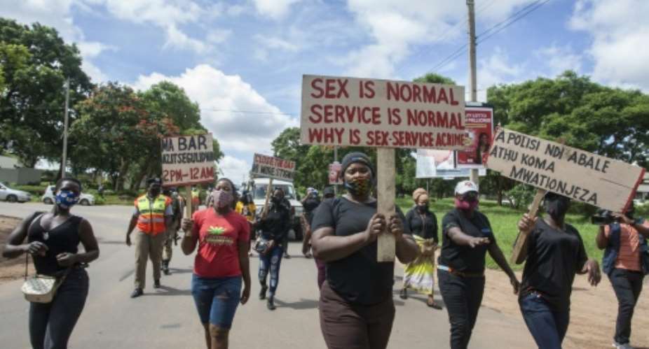 Sex workers in Malawi took part in a protest in January against Covid restrictions.  By AMOS GUMULIRA AFP